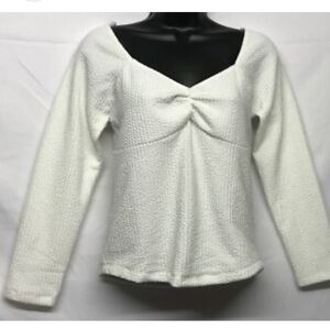 Maeve Cream Textured V-Neck Top with Bow Accent